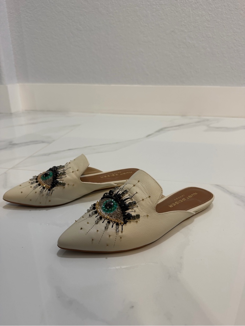 Kurt Geiger Cream Pointed Mules with Green Jewel Eye and Gold Beading